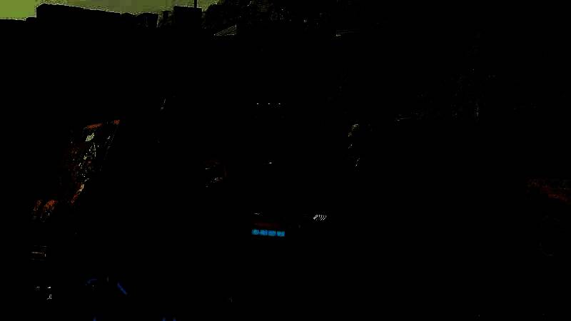 《死亡搁浅2》游戏场景截图，展示主角在荒野中行走的画面，环境细节丰富且充满未来感