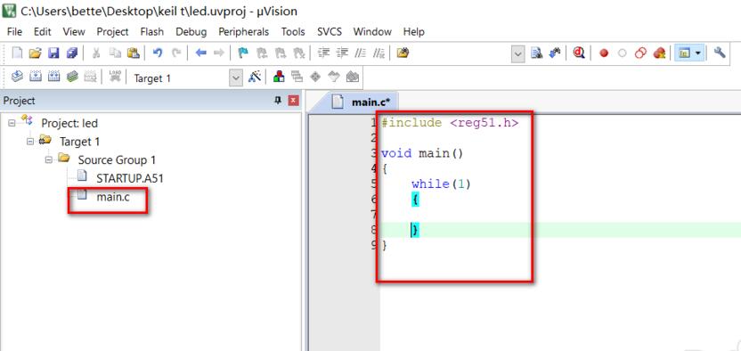Keil编辑界面展示main.c文件内容，包含基本的C语言主函数结构
