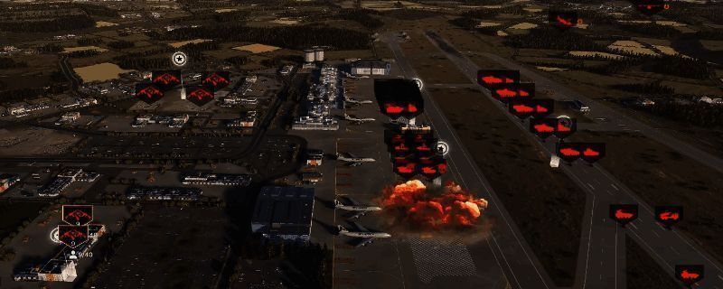 游戏中展示小当量炸弹与集束弹的投掷场景，空中战机正在对地面装甲部队进行轰炸