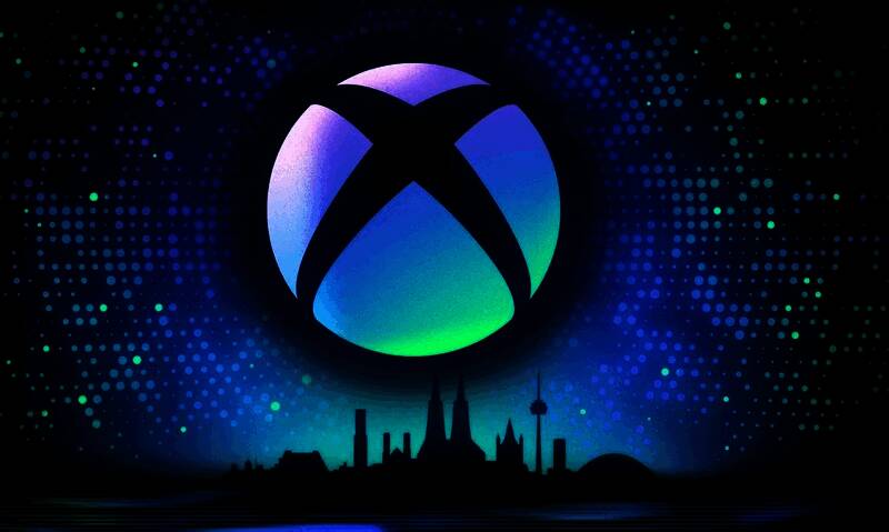 Xbox展区招牌细节特写，显示颜色明显褪色，呈现出蓝绿色调