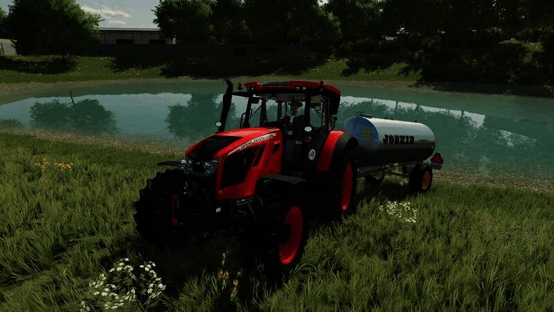 《模拟农场22》游戏界面展示农田作业场景，机械化设备正在耕作