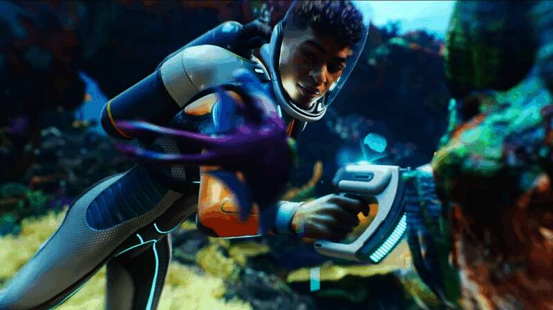 Unknown Worlds团队合影，背景为《深海迷航》游戏画面