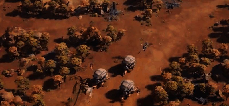 攻城部队集中火力突破城墙一角，士兵与投石车协同作战