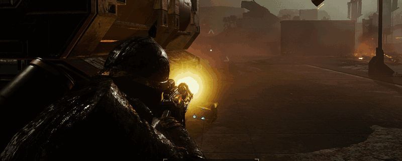 《绝地潜兵2》游戏内角色穿戴完整装备展示，手持主武器，周围有爆炸特效