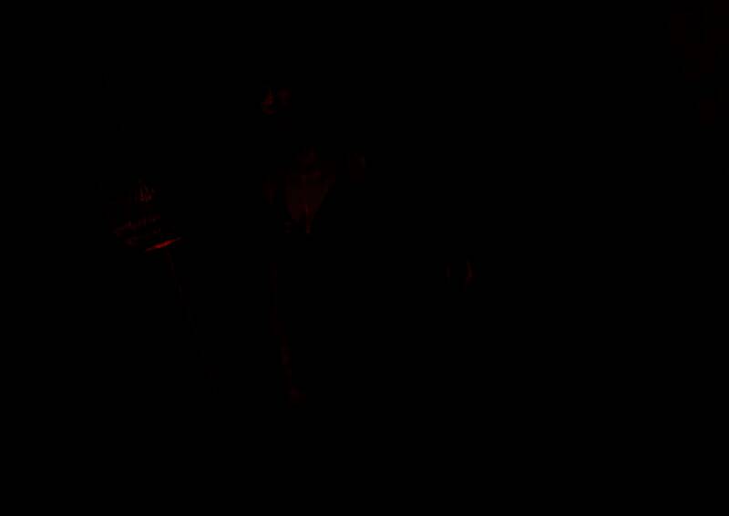 特写镜头下蒂法的面部表情生动自然，眼神坚定，光影效果逼真