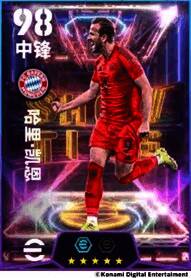 哈里·凯恩持球准备射门，表情专注，动作流畅