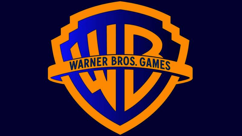 华纳兄弟游戏高层合影，背景为旗下知名游戏角色海报墙