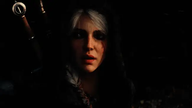 Miles Tost接受采访画面，背景为《巫师4》概念图