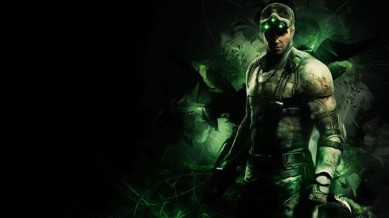 Clint Hocking在采访现场神情专注，背景为游戏画面投影