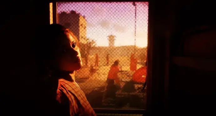 Take-Two CEO Strauss Zelnick接受采访画面，背景为公司标志与GTA系列LOGO