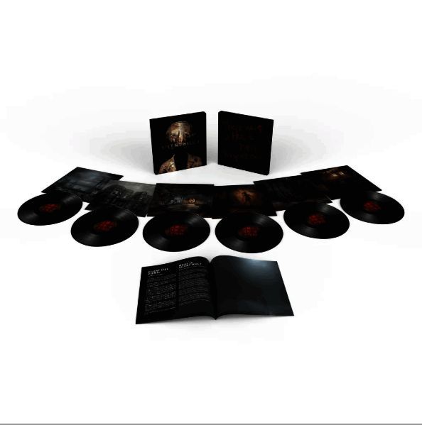 黑胶唱片正面特写，展示棕红色调与诡异纹理设计