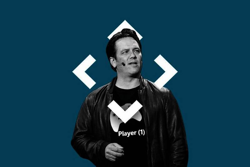 微软总部大楼全景，门前竖立Xbox和动视暴雪联合LOGO标识