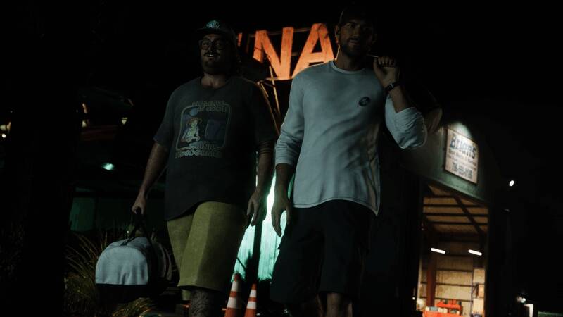 卡尔正在操作一台老式无线电设备，周围堆满书籍和技术手册