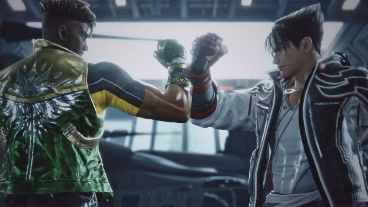 《铁拳8》游戏界面展示新拍照模式效果，角色站在擂台中央摆出胜利姿势，背景灯光绚丽