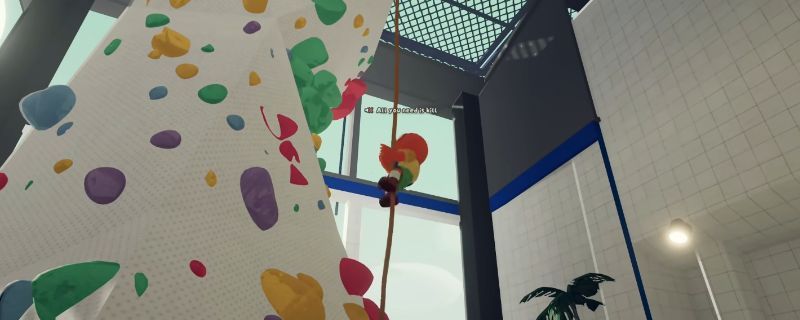 玩家角色在悬崖间使用绳索进行超级跳跃的动作瞬间，视角朝向上方绳索方向，动作流畅且富有张力