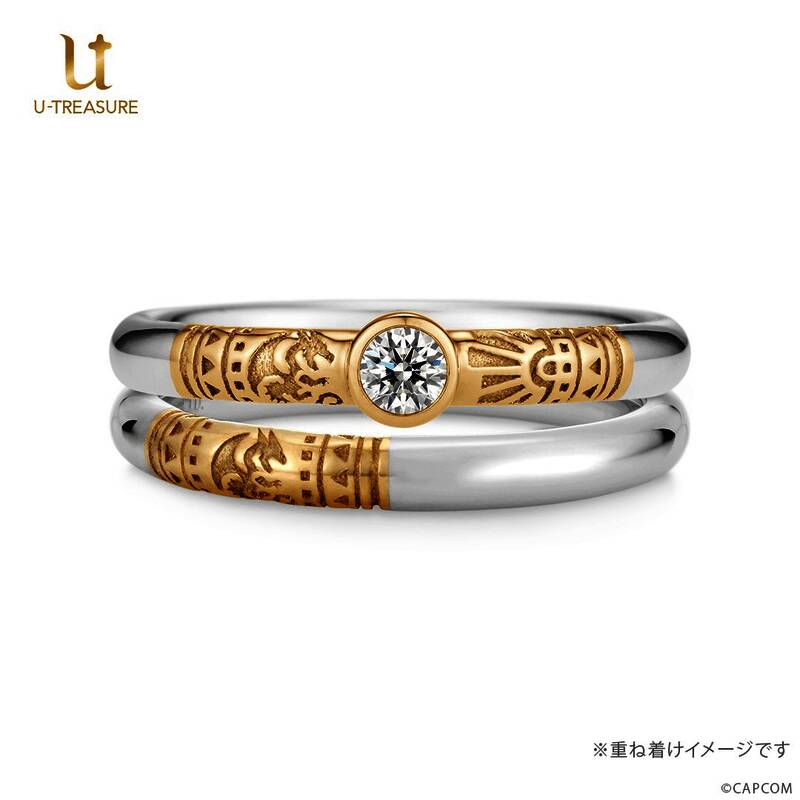 多款联名戒指陈列展示，每枚戒指中央镶嵌钻石，周围装饰风格各异，体现不同怪物主题