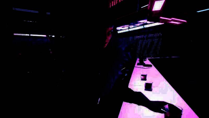 CDPR技术团队在工作室中讨论虚幻5引擎开发画面，背景显示多款游戏并行开发的项目看板