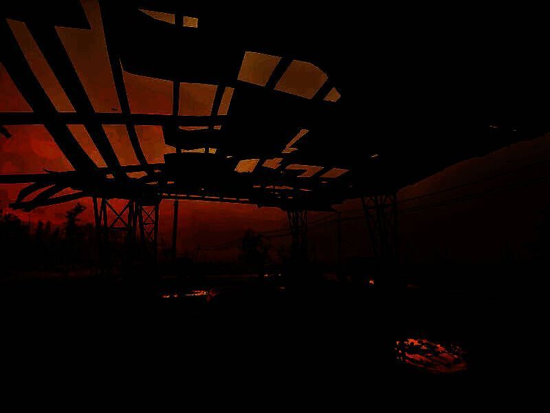 一片被藤蔓覆盖的研究站入口，锈迹斑斑的金属门半开，光线从缝隙中透入，充满神秘感