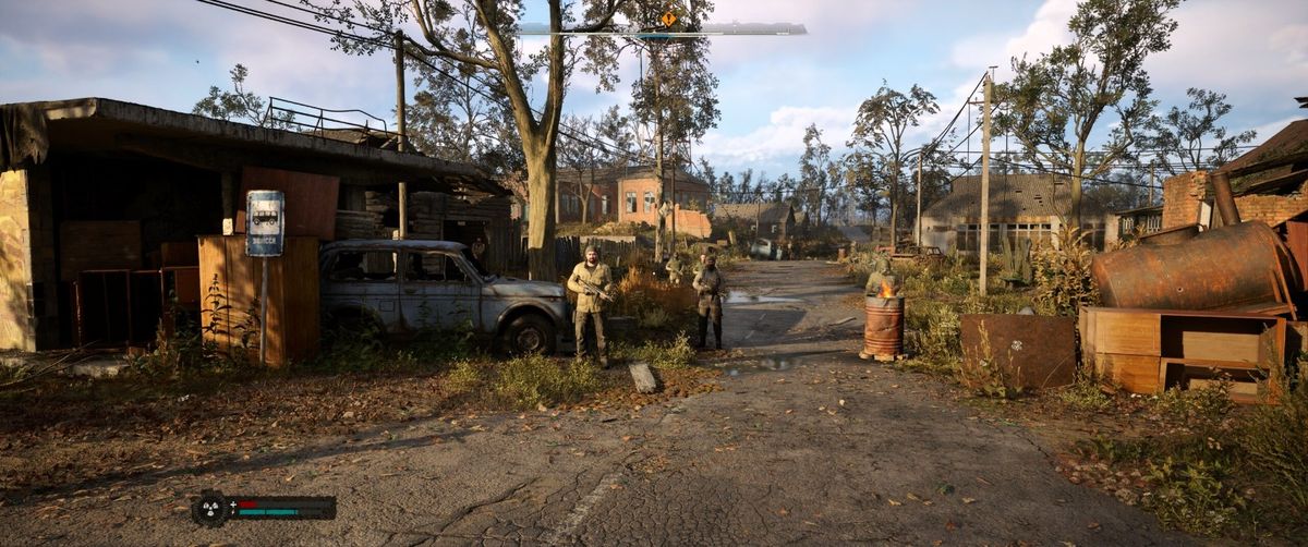 《潜行者2》游戏场景截图，昏暗的废墟中角色持枪前行，光影效果逼真