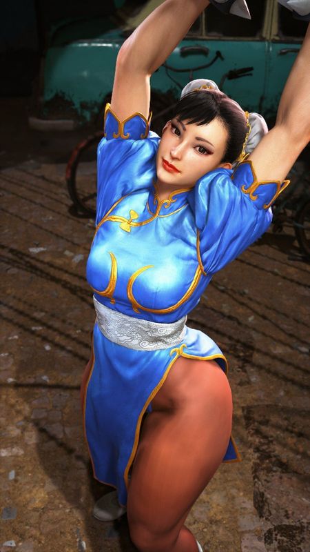 春丽蓄力准备出招，腿部肌肉紧绷，气势逼人