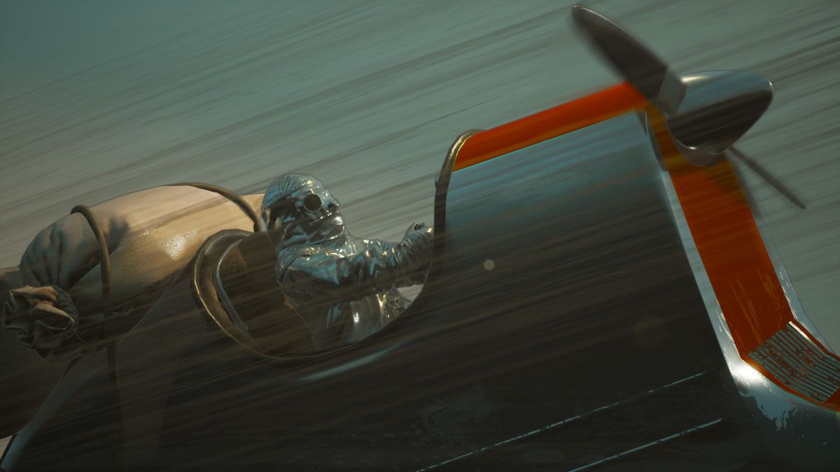 角色使用钩爪装置攀爬峭壁，前方是通往火山内部的幽暗洞穴，光影对比强烈，氛围神秘