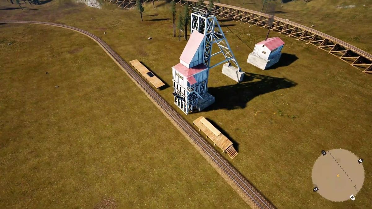 夜晚场景下，火车头灯光照亮前方铁轨，周围星空璀璨，氛围感十足