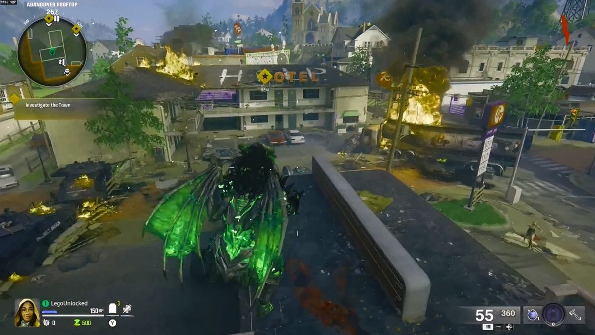 多人对战中一名玩家使用龙骑士皮肤空降战场，落地时触发火焰特效