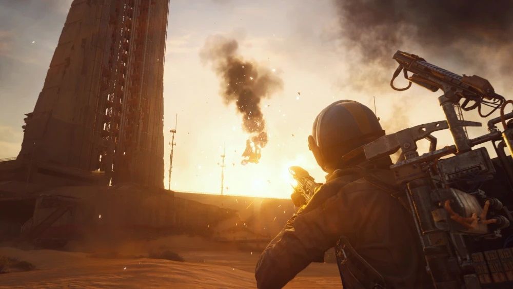 《ARC Raiders》游戏画面：一支Raider小队在破败城市废墟中行进，周围是倒塌的建筑与残存的机械残骸，氛围紧张压抑