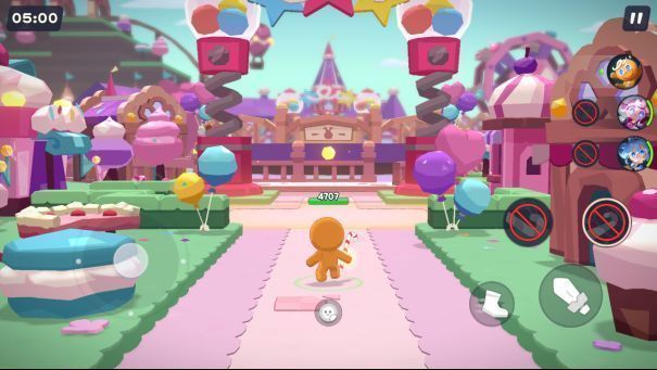 《饼干人联盟》游戏内战斗场景，多名饼干角色施展技能对抗敌人，画面充满卡通特效与动态光影