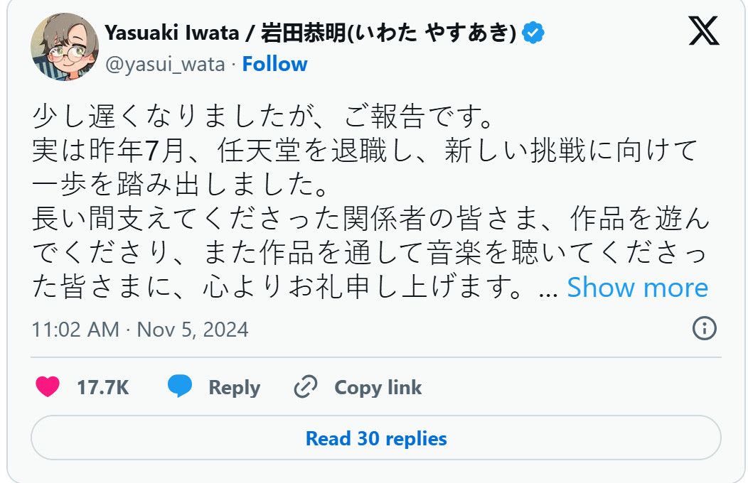 岩田恭明在录音室工作的场景，专注地操作音乐设备，周围布满专业音响与乐器