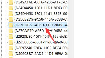 注册表中两个Flash相关的GUID项被选中，准备删除
