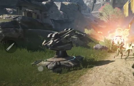 猎场任务战斗画面，玩家与巨型沙虫在沙漠遗迹中激烈交锋，机甲正在释放技能