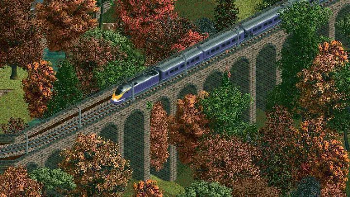 《运输大亨》经典游戏界面展示，玩家正在规划铁路与公路运输网络，画面呈现复古像素风格与城市布局