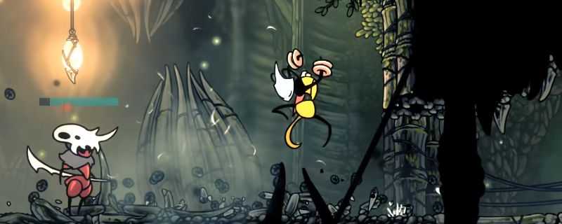 《空洞骑士：丝之歌》游戏内场景，角色位于神秘洞穴中，周围布满发光晶体，营造出奇幻氛围