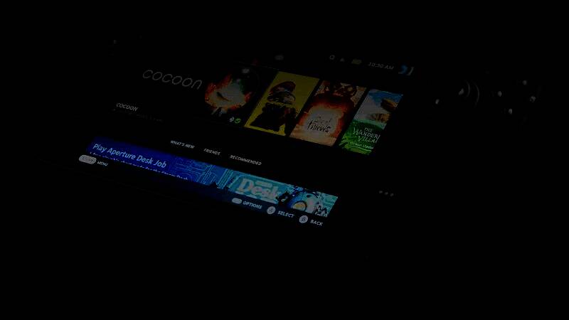 Steam Deck手持设备展示图，设备正面为游戏手柄设计，屏幕清晰可见