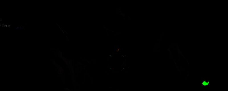 《无主之地4》游戏中玩家骑乘摩托车穿越荒漠地带，远处可见身穿红色披风的NPC拉文站在废墟旁，周围有两个可交互的金属箱