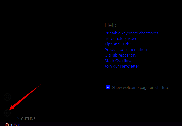Vscode界面左下角齿轮图标特写，用于打开设置菜单