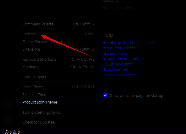 VSCode设置菜单中指向Settings选项的鼠标指针