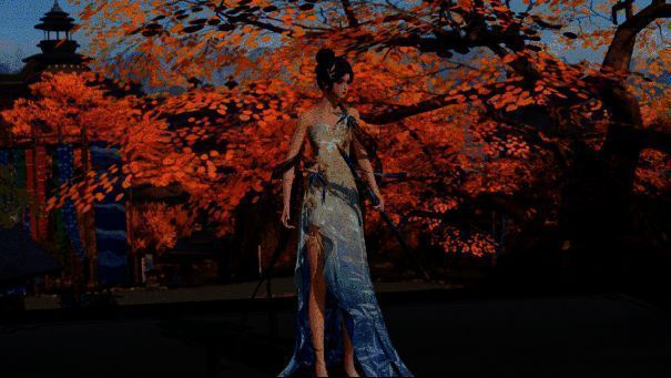 ‘修罗城’主题下【晨夕・绣湘君】局部特写，金线刺绣叶片脉络分明，蓝绿色调点缀如天空倒影