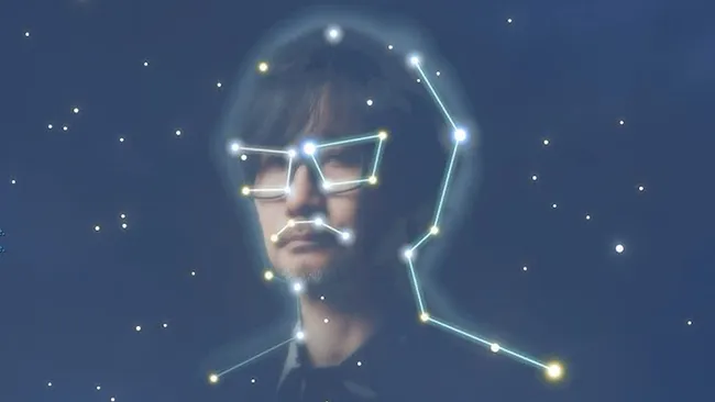 小岛秀夫在工作室中专注工作的场景，背景显示《死亡搁浅2》的游戏画面投影