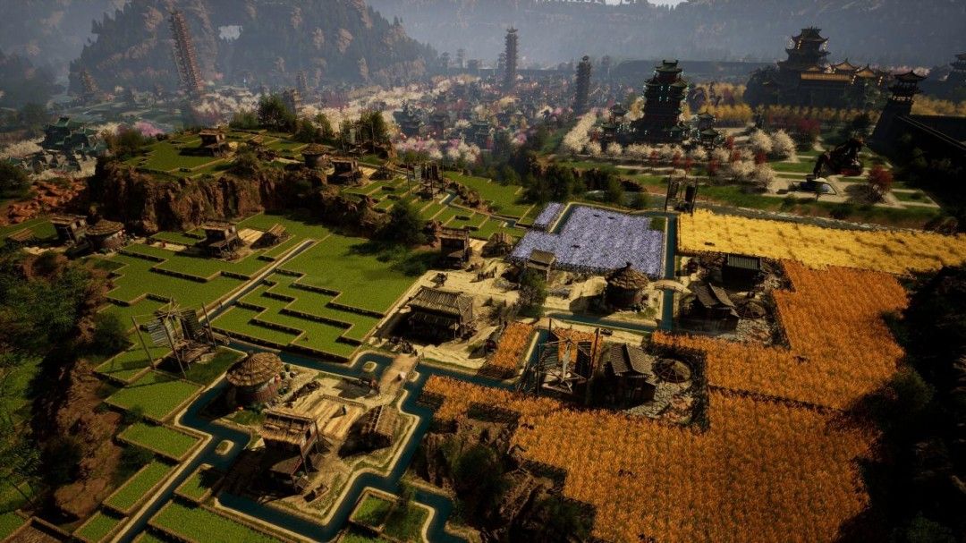 游戏中玩家正在规划住宅区与农田的布局，画面细腻展现稻田、木屋与小桥流水的田园风光