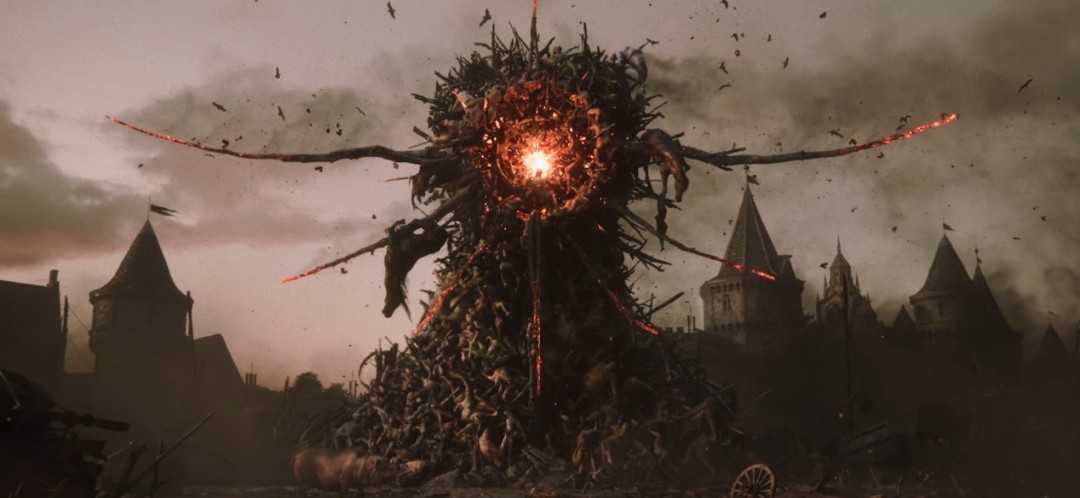 《神界》CGI预告片截图，展现黑暗幻想风格的宏大场景，天空阴沉，废墟中矗立着神秘巨像，氛围压抑而震撼